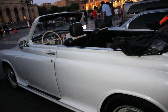 Yerevan city tour with drinks in a classic car with photography - Guide style, photography, and the Armenian drink
